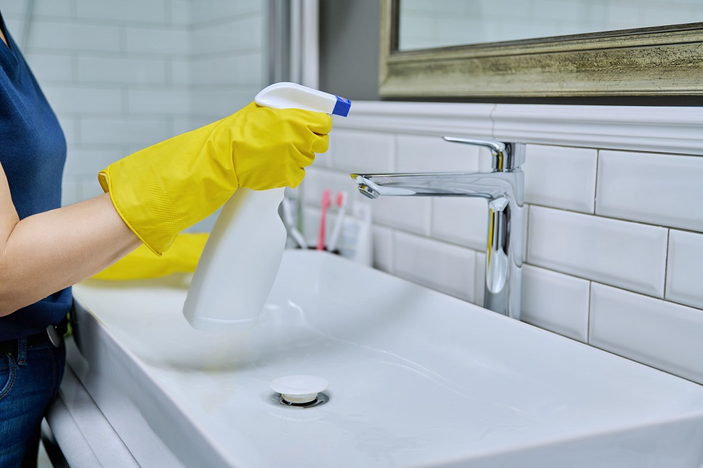 close-up-of-cleaning-sink-with-faucet-in-bathroom-2024-12-08-04-40-57-utc